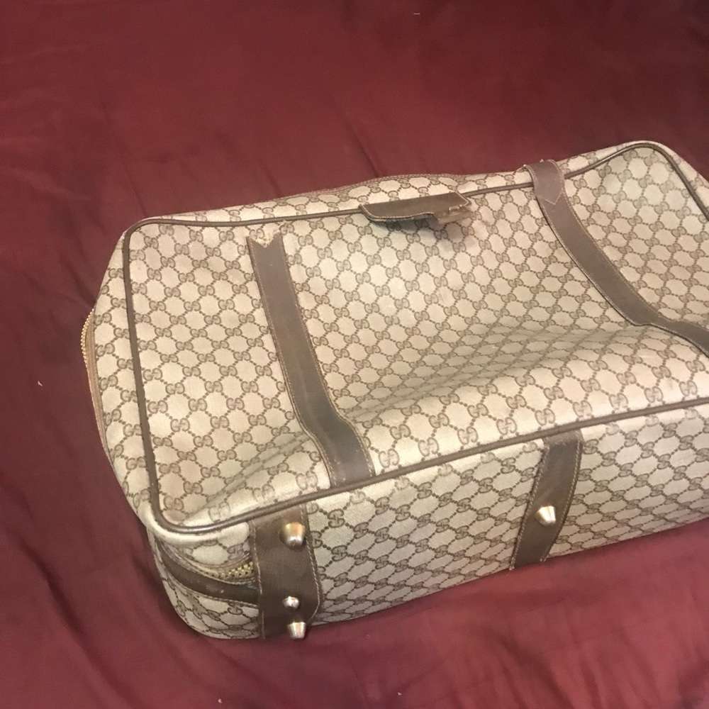 Gucci suitcase.